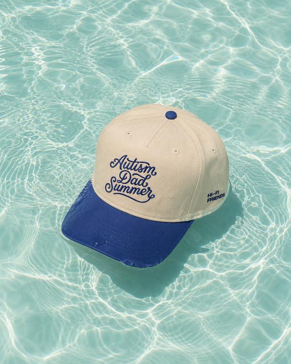 Autism Dad Summer design embroidered on a high-profile, sensory-friendly snapback hat.
