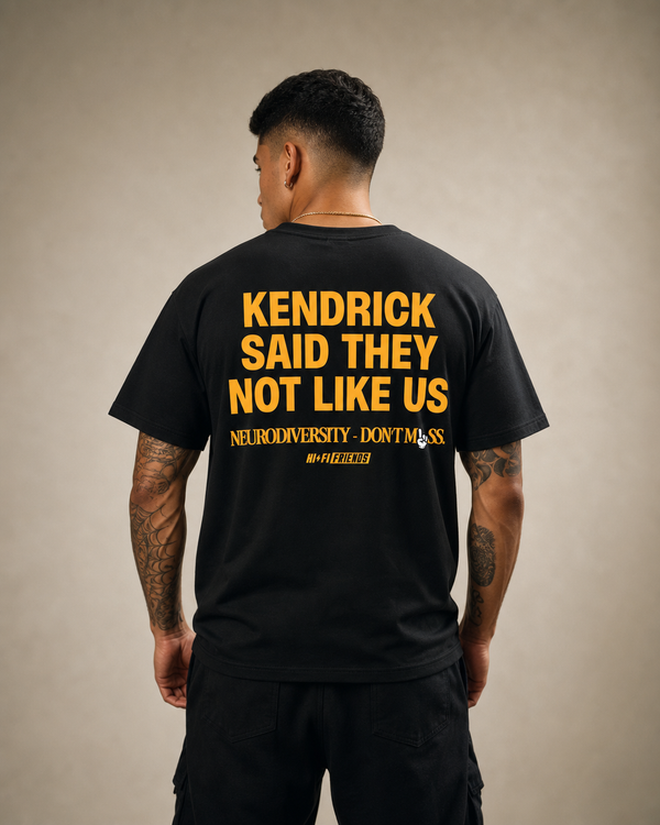 Not Like Us design on a unisex tee.