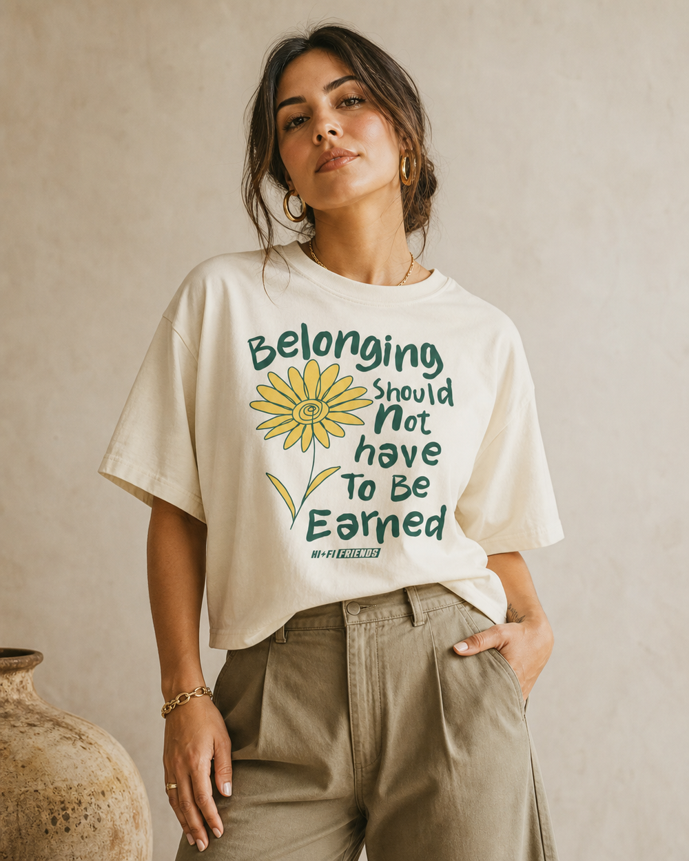 Belonging Should Not Have To Be Earned design on a women's seamless boxy tee.