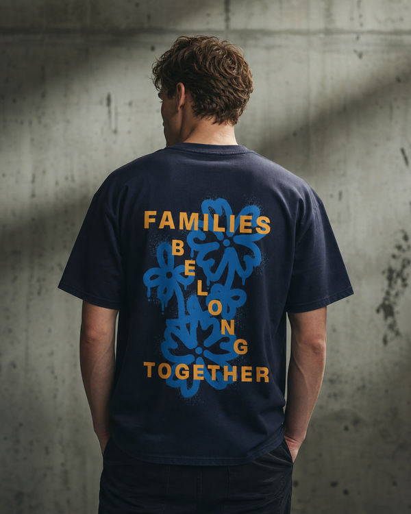 Families Belong Together design on a unisex tee.