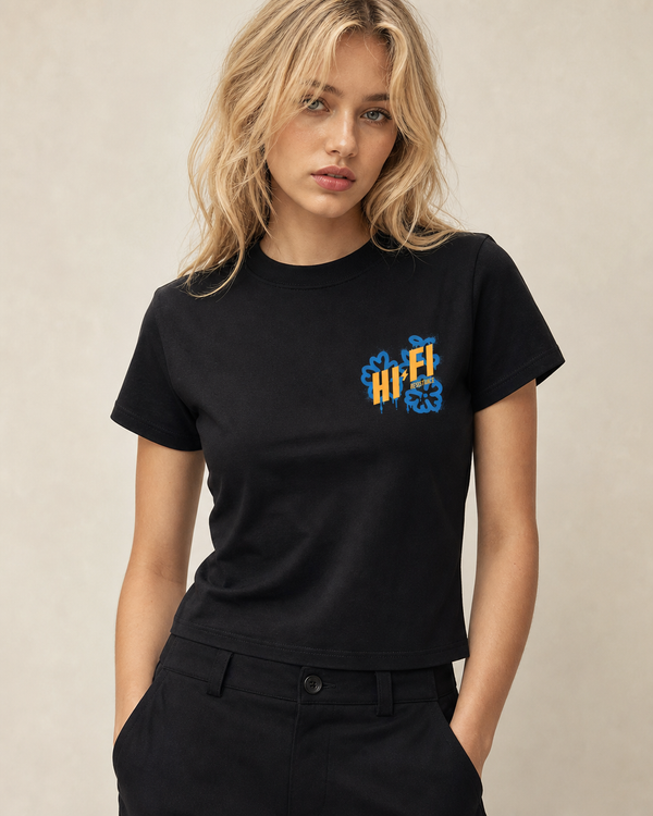 Families Belong Together design on a women's essential tee.