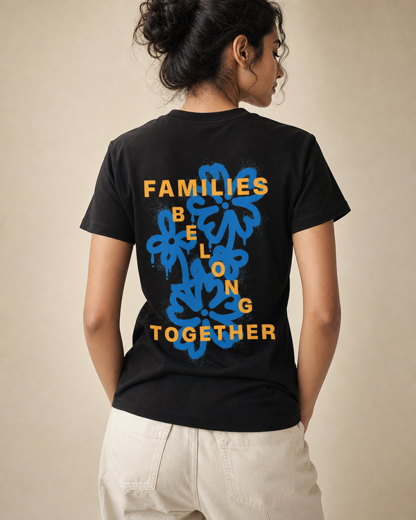 Families Belong Together design on a women's essential tee.