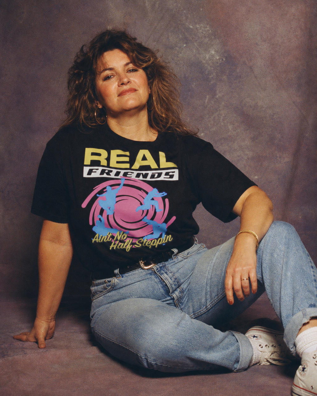 Real Friends Ain't No Half Steppin' design on a women's seamless boxy tee.
