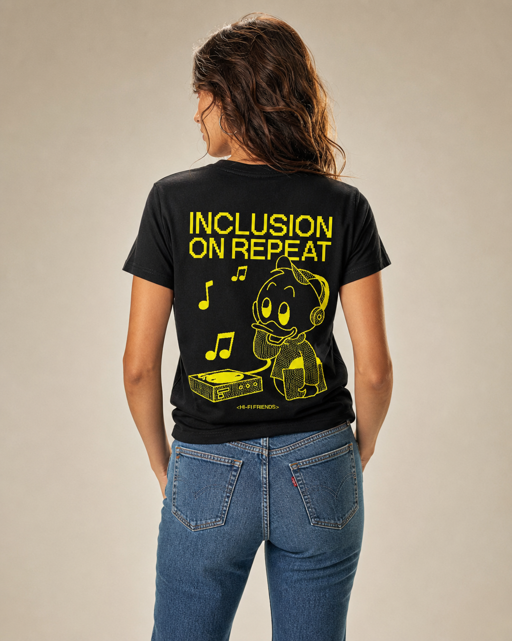 Inclusion On Repeat (Huey) design on a women's essential tee.