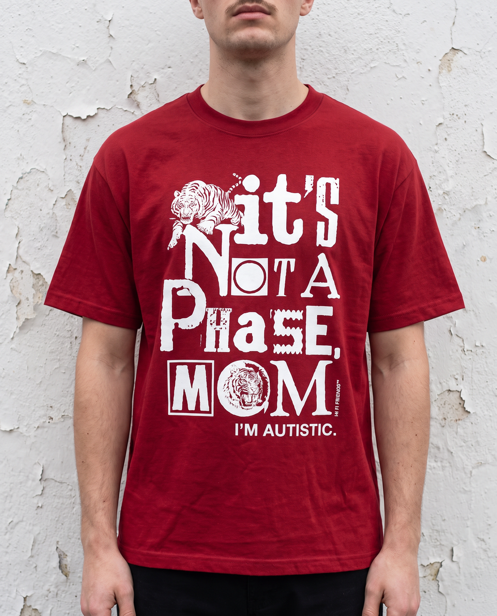 Wine Red, It's Not A Phase Mom tee, ransom-note text reading I'm autistic