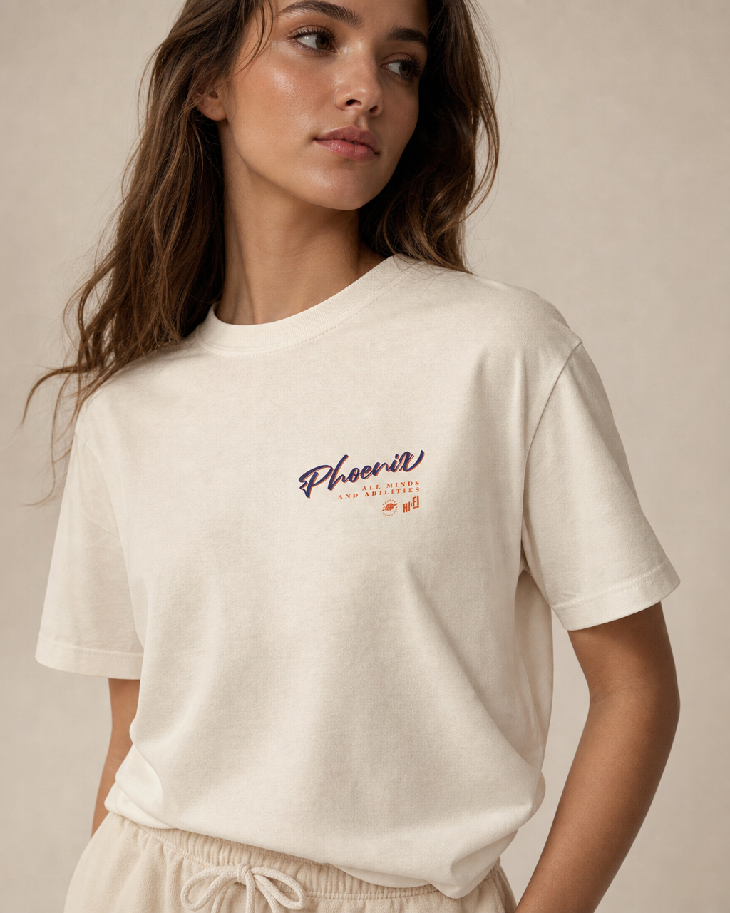 Phoenix Sons and Daughters design on a women's seamless boxy tee.