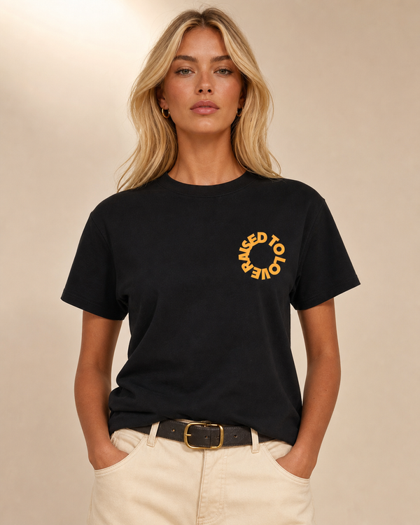 Raised To Love design on a women's essential tee.
