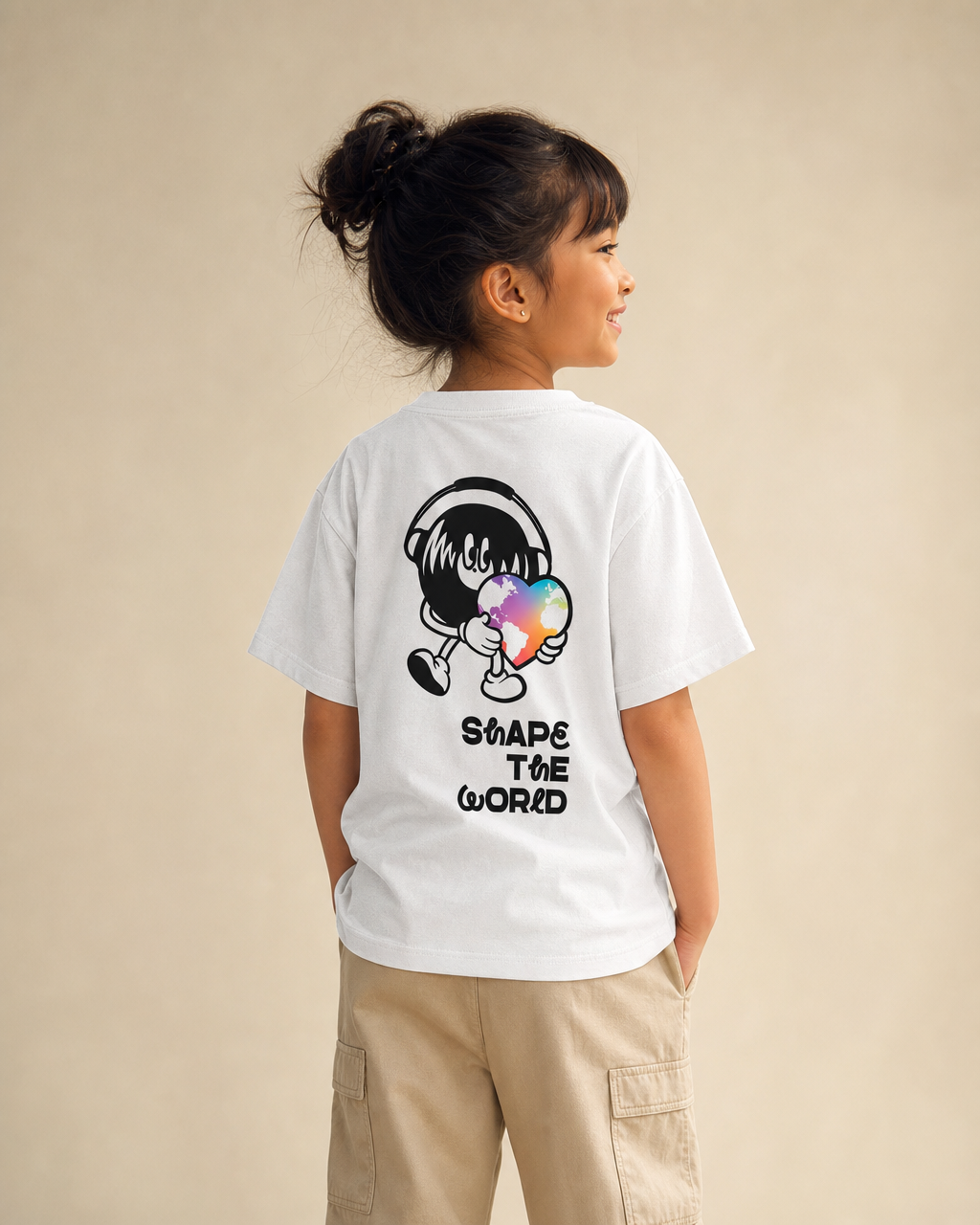 Shape The World design on a youth tee.