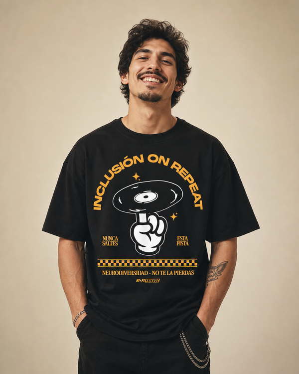 Inclusión On Repeat design on a unisex tee.