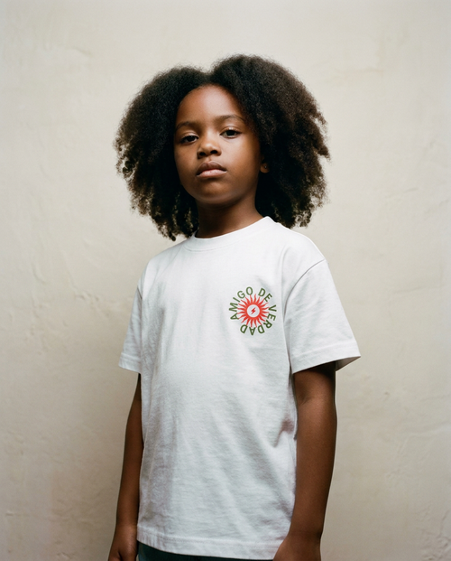 Amigo De Verdad design on a heavyweight, sensory-friendly youth tee