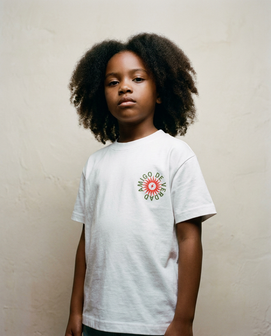 Amigo De Verdad design on a heavyweight, sensory-friendly youth tee