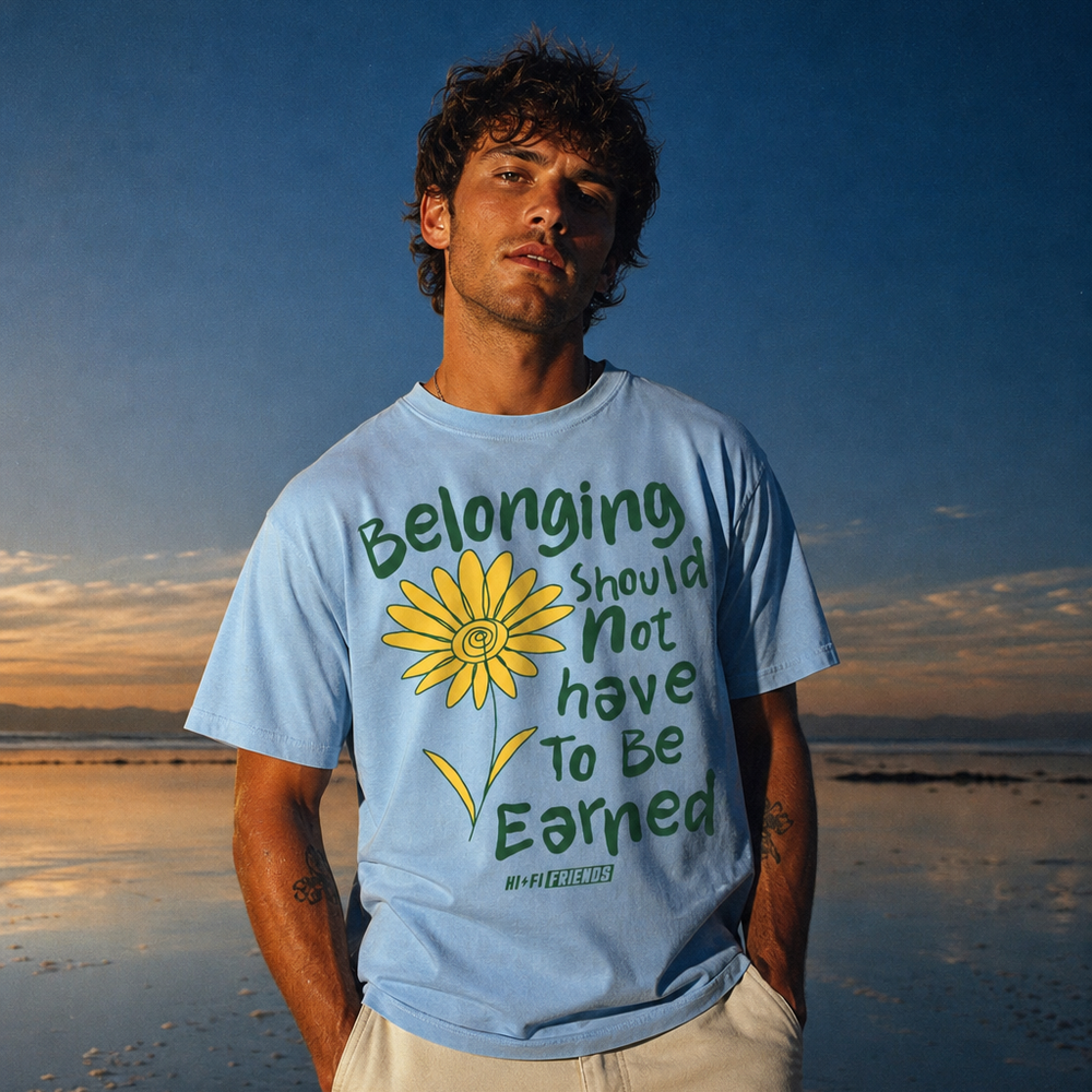 Belonging Should Not Have to Be Earned design on a heavyweight adult unisex graphic tee.