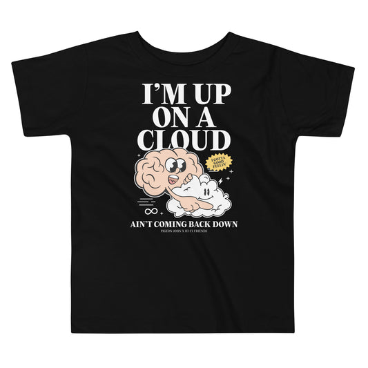 Toddler black t-shirt featuring a colorful illustration of a pink brain mascot riding on a white cloud mascot with "Up on a Cloud" styling.