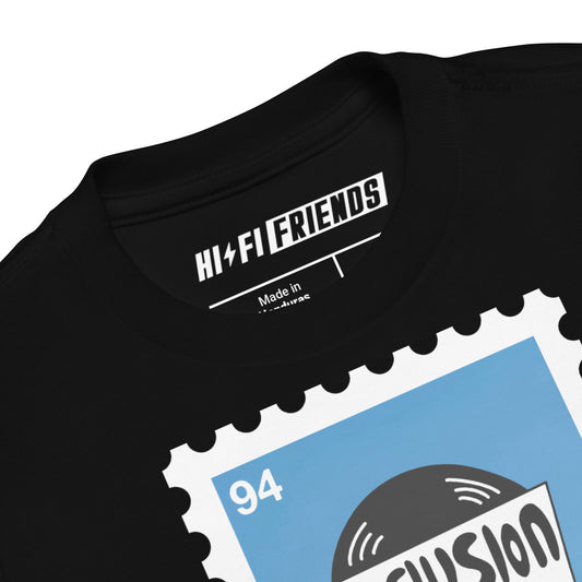 "Inclusion on Repeat" toddler short sleeve t-shirt featuring the rhythmic, high-impact typography.
