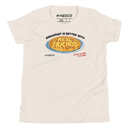 "Better Breakfast with Real Friends" youth t-shirt featuring a high-fidelity, playful breakfast graphic and clean, modern typography.